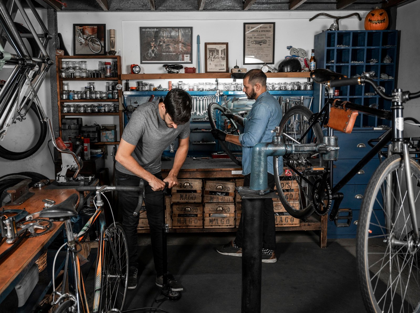 Wide view of the CycleFix workshop floor with bicycles set up on repair stands